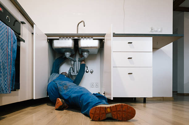 Professional Drain Cleaning technician working in Worley, ID